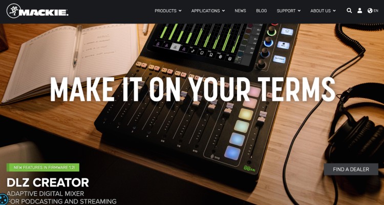 Mackie DLZ Creator adaptive digital mixer for podcasting and streaming on a desk with headphones
