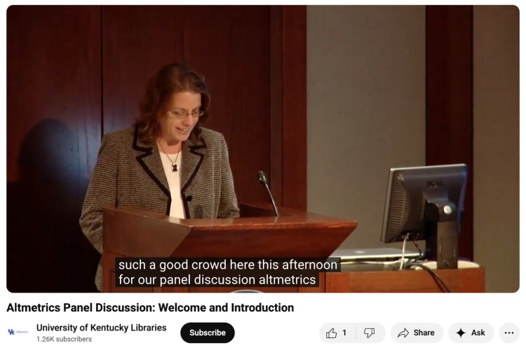 Speaker at a podium delivering the welcome and introduction as an example of a panel discussion at the University of Kentucky Libraries