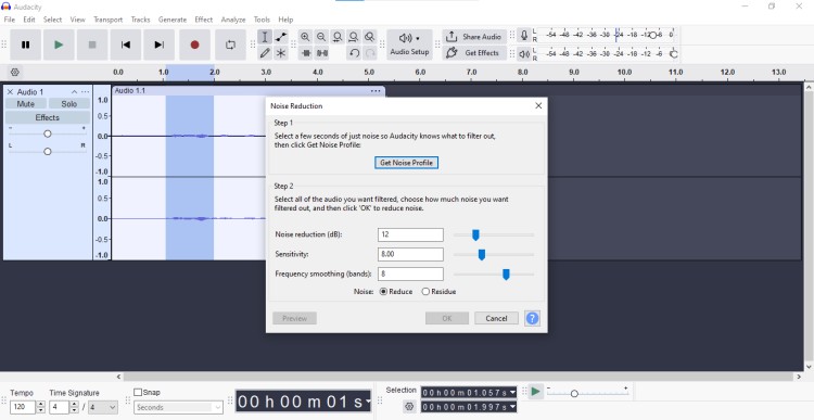 Screenshot of Audacity showing noise reduction settings used to clean up audio recordings by adjusting noise profile, sensitivity, and frequency smoothing.