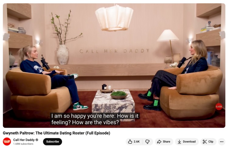 Screenshot from the Call Her Daddy podcast interview featuring two women seated in a studio, showing an example of using questions that invite deeper conversation and connection.