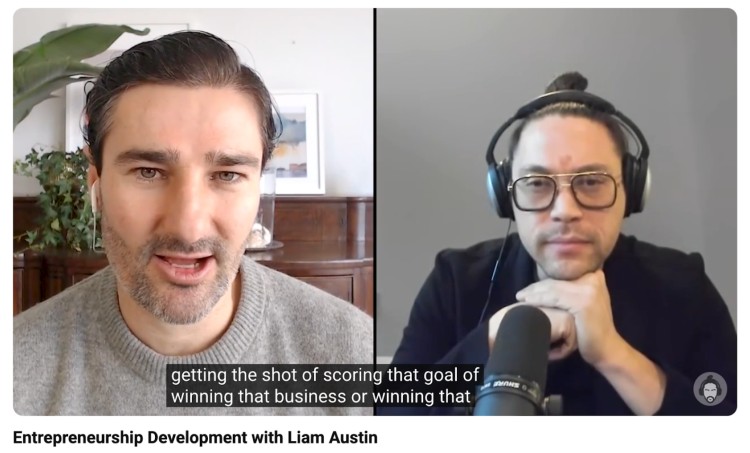 Liam Austin speaking in an entrepreneurship development interview where he and another expert give advice on business growth, mindset, and achieving success.
