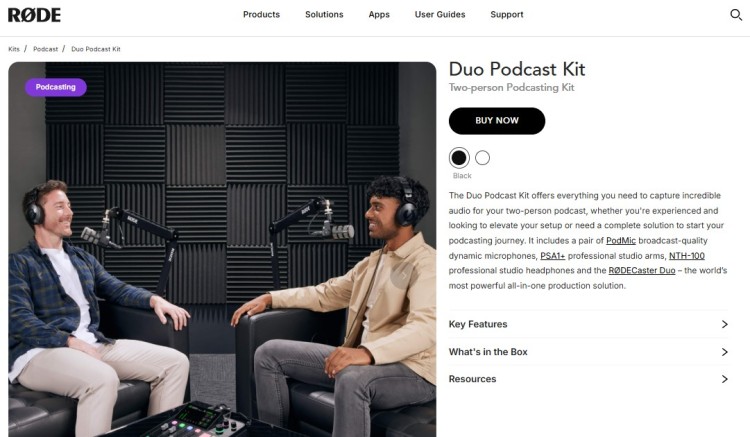 Podcast studio setup showing guest and host recording a two-person podcast with microphones and headphones