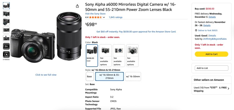 Sony Alpha a6000 mirrorless camera for video, shown with zoom lenses on an online product page for content creators.