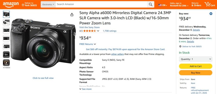 Sony Alpha a6000 mirrorless camera shown for video podcast recording with interchangeable lens and compact setup.