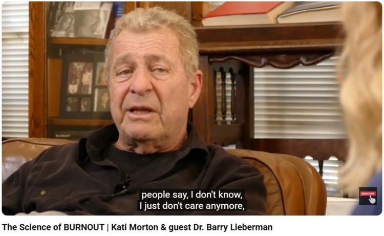 Expert discussing burnout during an interview, demonstrating informative speaking about mental health and emotional well-being.