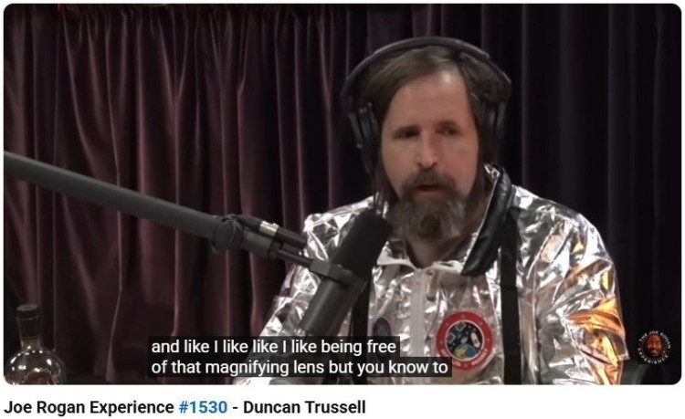 Duncan Trussell speaking on the Joe Rogan Experience podcast, showing engaging content from episode 1530 with a live conversation setup