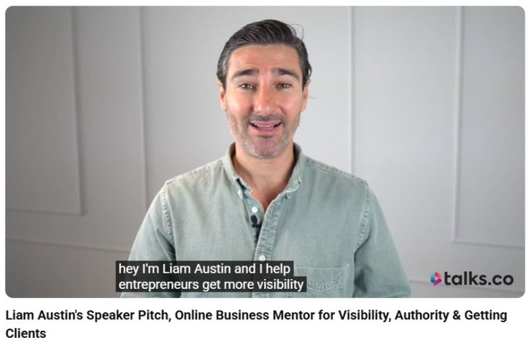 Liam Austin speaking in a video introducing himself as the founder of Talks.co and explaining how he helps entrepreneurs gain visibility and clients.
