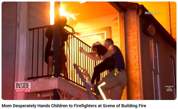 News footage of firefighters rescuing children from a burning building, showing how media reports also use pathos to highlight emotional human moments.