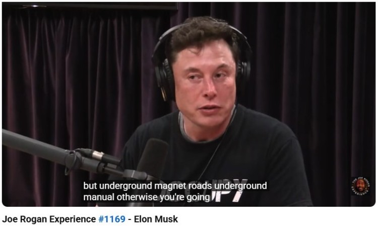 Elon Musk speaking on the Joe Rogan Experience podcast during an interview, see a moment from episode 1169 discussing technology and future ideas