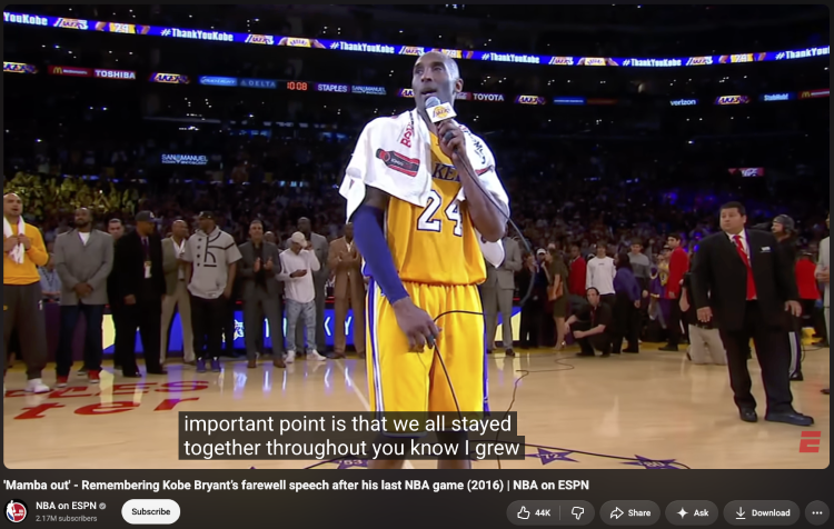 A sincere farewell speech delivered on a basketball court in front of a large audience