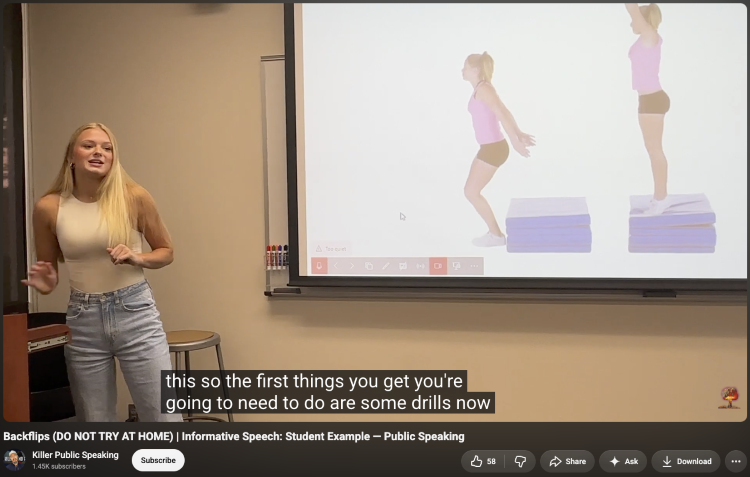 Student presenting instructional visuals as supporting evidence during an informative speech
